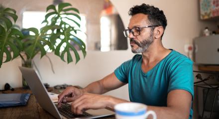 Man working in insurance knowledge database